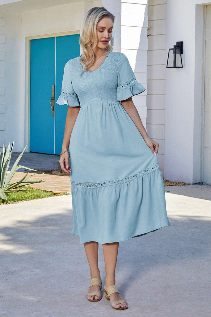 GRACE KARIN Smocked Bodice Dress Casual Short Bell Sleeve V-Neck A-Line DressPlease check the measurements below and choose the right . Size US UK DE Unit Fit Bust Fit Waist Back Length Sleeve Length S 4~6 8~10 34~36 cm 86.5~89 66~68.5 116 26 inch 34~35 2