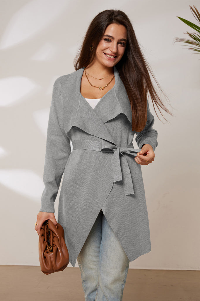 GRACE KARIN Mid-Thigh Length Cardigan Long Sleeve Irregular Lapel Sweater​Please check the measurements below and choose the right size. Size US UK DE Unit Recommended Body size Garment Bust Waist Back Length Sleeve Length S 4~6 8~10 34~36 cm 86.5~89 70~7