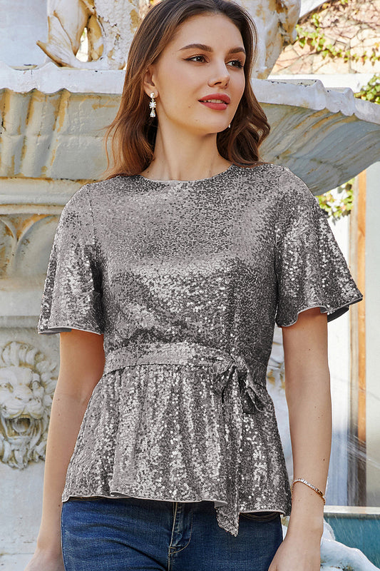 GRACE KARIN Sequined Short Bell Sleeve Party TopsPlease check the measurements below and choose the right size. Size US UK DE Unit Fit Bust Fit Waist Length Sleeve Length S 4~6 8~10 34~36 cm 86.5~89 66~68.5 64.0 23.0 inch 34~35 26~27 25.2 9.1 M 8~10 12~14